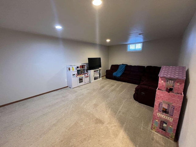 living area with baseboards, recessed lighting, and light colored carpet