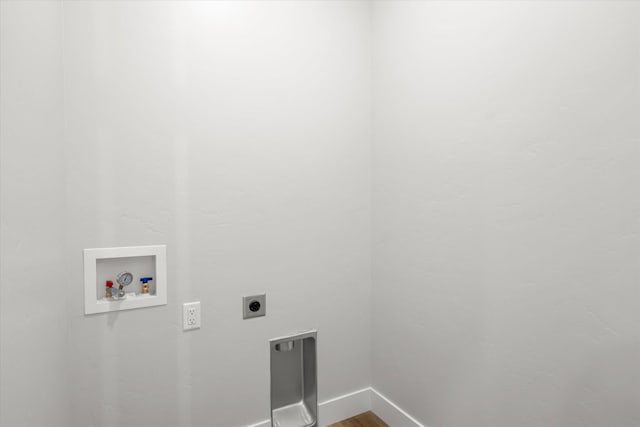 laundry room with hookup for a washing machine, laundry area, baseboards, dark wood-style floors, and electric dryer hookup