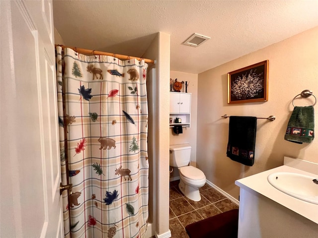 full bath with tile patterned flooring, visible vents, toilet, vanity, and a textured ceiling