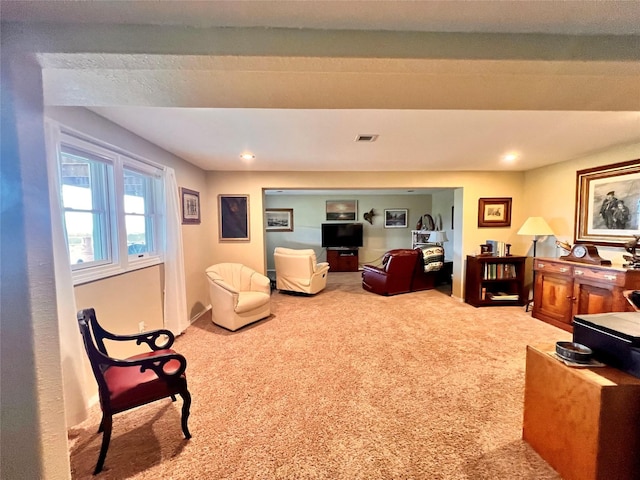 living room featuring visible vents, recessed lighting, and carpet floors