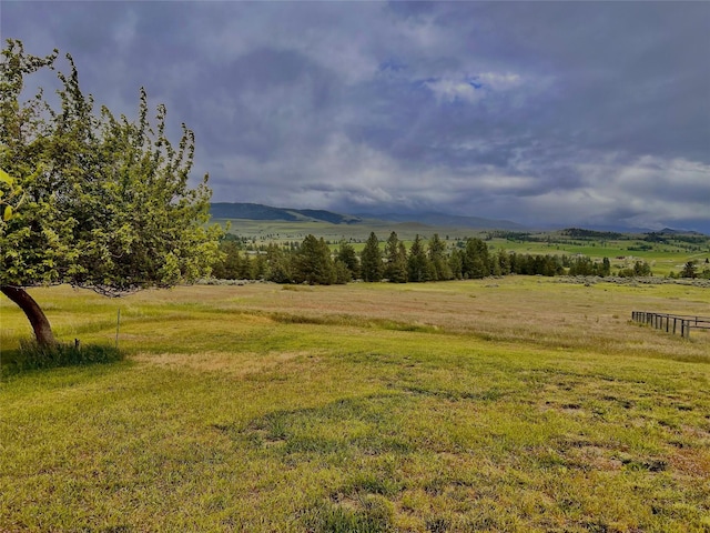 view of mountain feature with a rural view