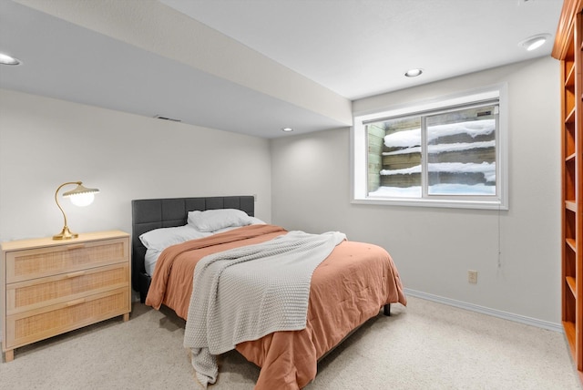 bedroom featuring recessed lighting, light colored carpet, visible vents, and baseboards