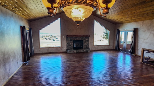 3 Paradise Ridge Rd, Clancy, MT 59634 - unfurnished living room with a stone fireplace, hardwood / wood-style flooring, wood ceiling, baseboards, and a textured wall