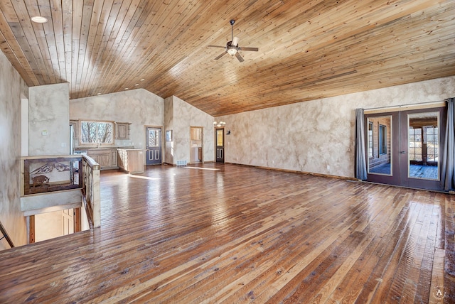 3 Paradise Ridge Rd, Clancy, MT 59634 - unfurnished living room with hardwood / wood-style flooring, wood ceiling, lofted ceiling, ceiling fan, and french doors