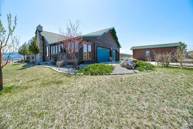 3 Paradise Ridge Rd, Clancy, MT 59634 - rear view of property with a lawn and a chimney