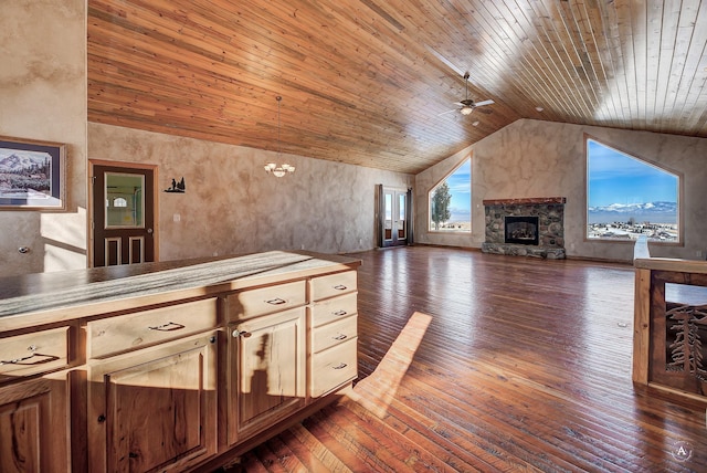 3 Paradise Ridge Rd, Clancy, MT 59634 - unfurnished living room with lofted ceiling, wooden ceiling, ceiling fan, a fireplace, and dark wood finished floors