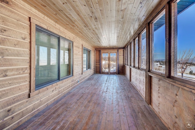 3 Paradise Ridge Rd, Clancy, MT 59634 - unfurnished sunroom with wood-type flooring, wooden ceiling, wooden walls, and french doors