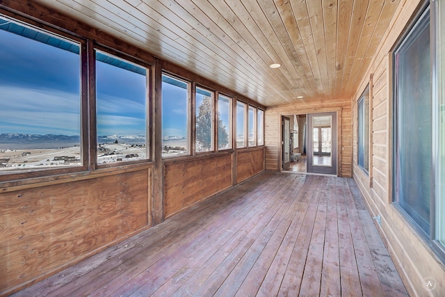 3 Paradise Ridge Rd, Clancy, MT 59634 - unfurnished sunroom with wooden ceiling, wood walls, and hardwood / wood-style flooring