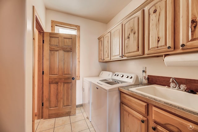 3 Paradise Ridge Rd, Clancy, MT 59634 - laundry area with washer and dryer, cabinet space, light tile patterned flooring, and baseboards