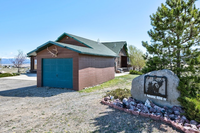 3 Paradise Ridge Rd, Clancy, MT 59634 - view of property exterior with gravel driveway and a shingled roof