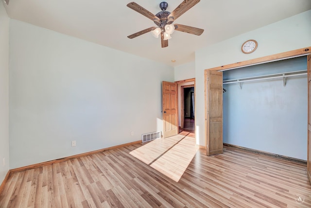 3 Paradise Ridge Rd, Clancy, MT 59634 - unfurnished bedroom featuring light wood-style floors, baseboards, a closet, and a ceiling fan