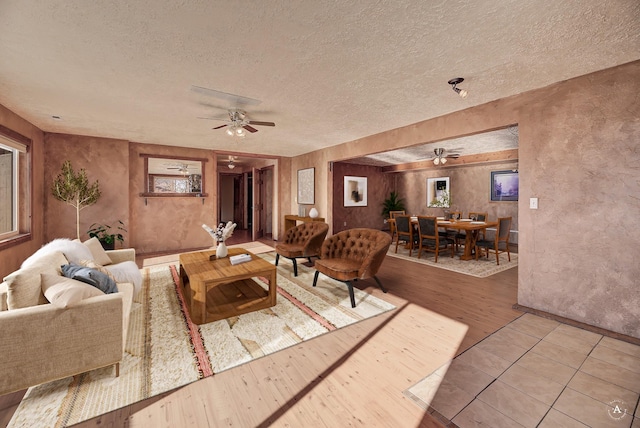 3 Paradise Ridge Rd, Clancy, MT 59634 - living area with ceiling fan, a textured ceiling, and light wood-style floors
