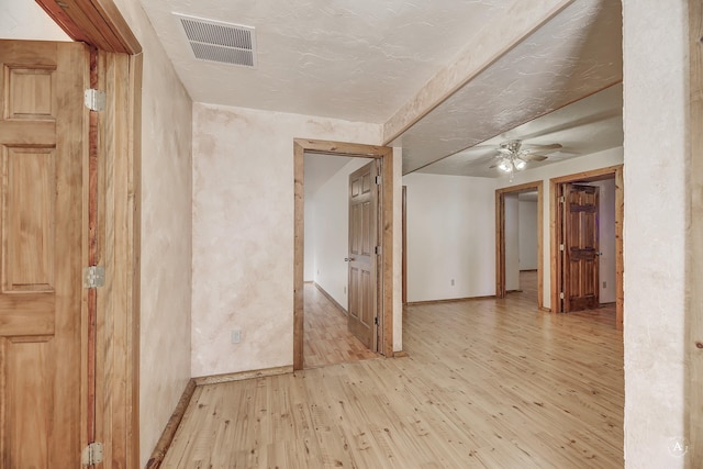 3 Paradise Ridge Rd, Clancy, MT 59634 - unfurnished room with light wood finished floors, baseboards, and ceiling fan