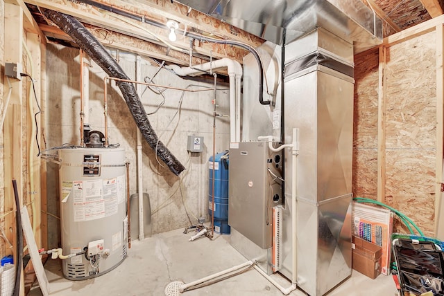 3 Paradise Ridge Rd, Clancy, MT 59634 - utility room featuring water heater and heating unit
