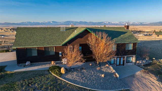3 Paradise Ridge Rd, Clancy, MT 59634 - view of front facade with a mountain view, a patio, and a shingled roof
