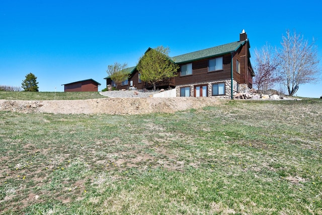3 Paradise Ridge Rd, Clancy, MT 59634 - view of side of property with a chimney and a yard