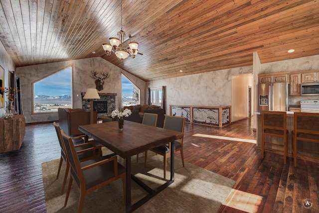 3 Paradise Ridge Rd, Clancy, MT 59634 - dining room featuring wood ceiling, dark wood-style floors, vaulted ceiling, a chandelier, and a stone fireplace