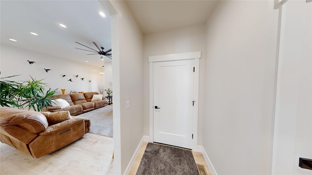 entryway featuring baseboards, a ceiling fan, and recessed lighting