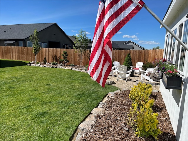 view of yard with a fenced backyard and a patio