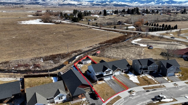 aerial view with a residential view and a mountain view