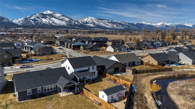 birds eye view of property featuring a residential view and a mountain view