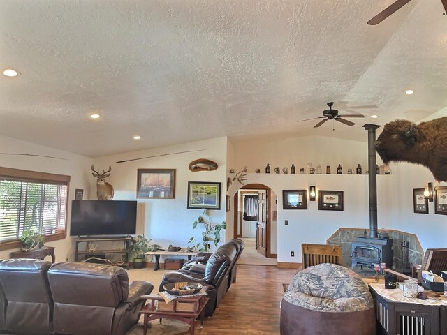 dining space with lofted ceiling, dark wood-style floors, and a notable chandelier