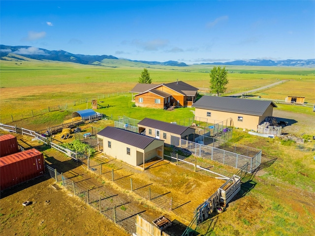 aerial view with a mountain view and a rural view