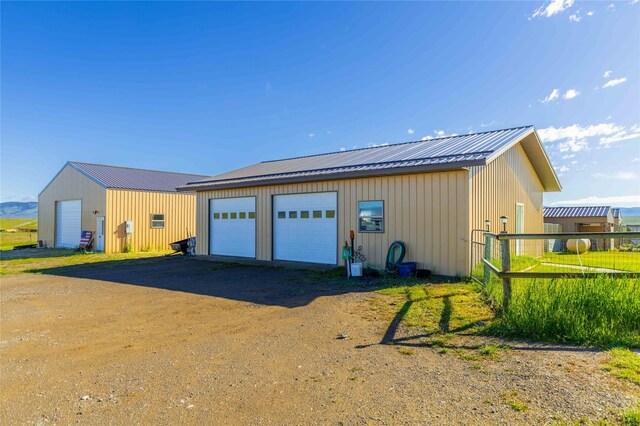 back of property with a patio area, a playground, and a lawn