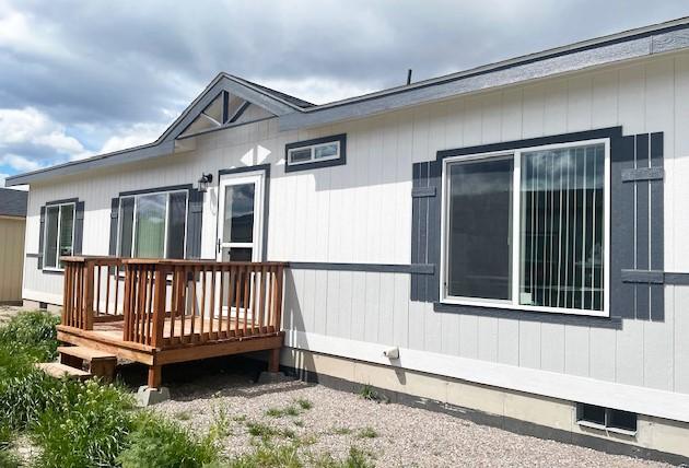 view of home's exterior with a deck