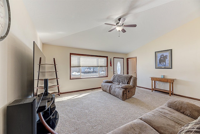 carpeted living area featuring lofted ceiling, ceiling fan, and baseboards