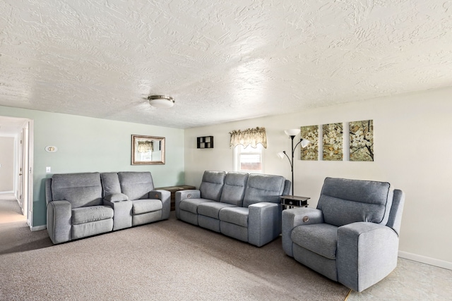 living room featuring light carpet, a textured ceiling, and baseboards