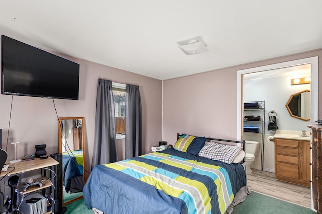 bedroom with light wood-style flooring