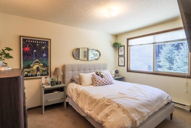 carpeted bedroom with a textured ceiling and a baseboard radiator