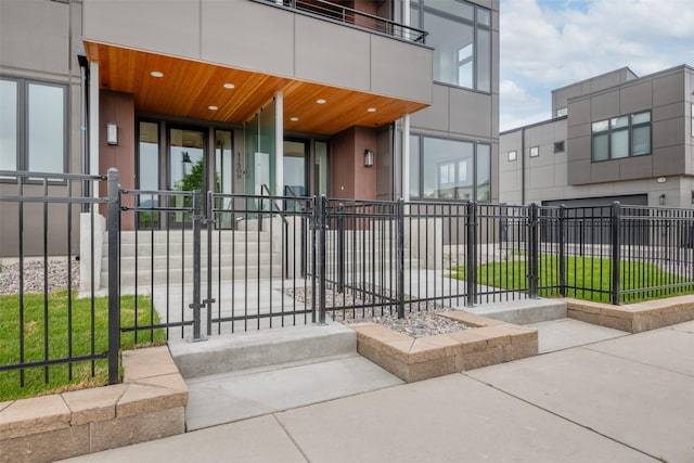 view of gate featuring fence