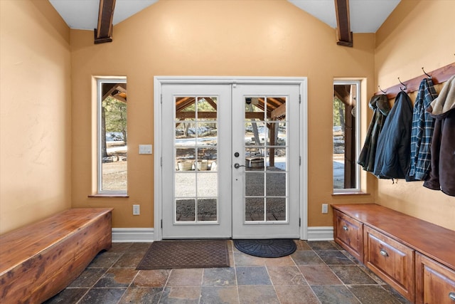 mudroom with baseboards, stone tile flooring, and french doors