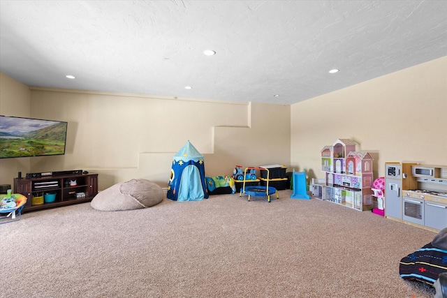 playroom featuring carpet flooring and recessed lighting