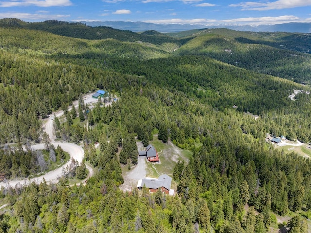 bird's eye view featuring a mountain view and a forest view