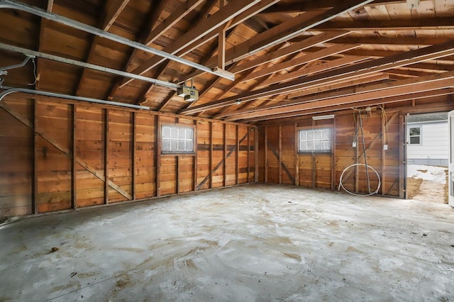 garage featuring a garage door opener