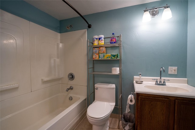 bathroom featuring bathing tub / shower combination, toilet, and vanity