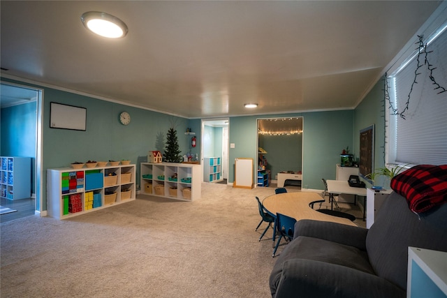 playroom with baseboards, carpet floors, and crown molding