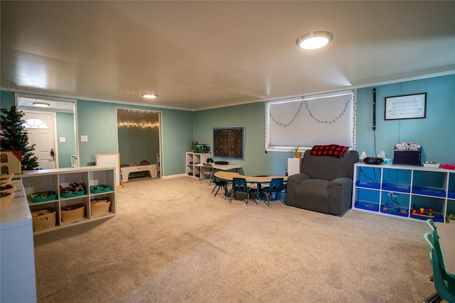 game room featuring carpet floors and crown molding