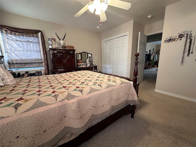 carpeted bedroom featuring ceiling fan, baseboards, and a closet