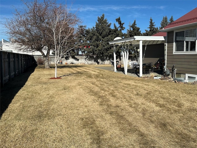 view of yard with a patio area and a fenced backyard