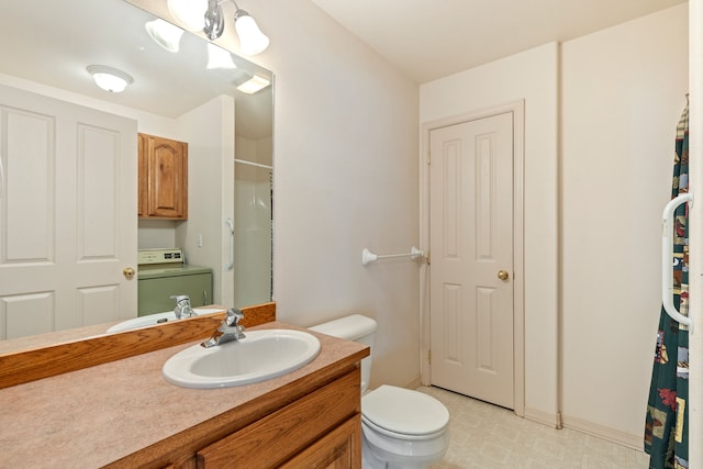 full bath with washer / clothes dryer, vanity, toilet, and tile patterned floors