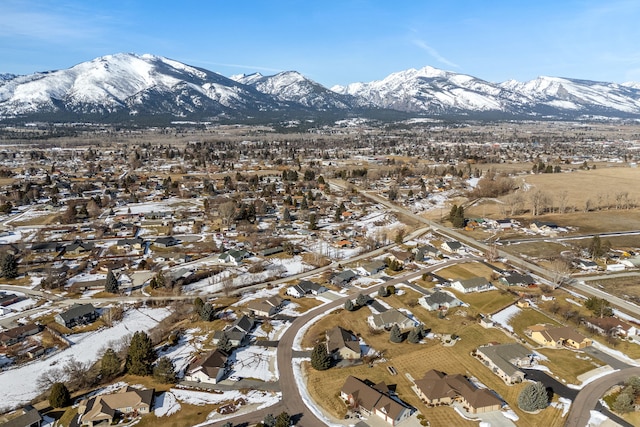 drone / aerial view with a residential view and a mountain view