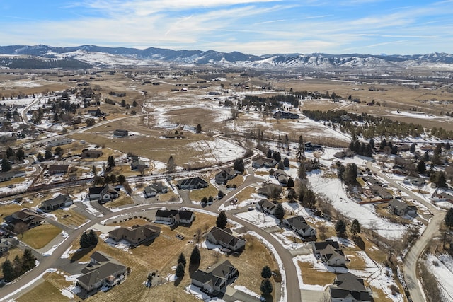 drone / aerial view with a residential view and a mountain view