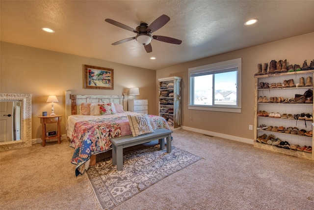 bedroom with baseboards, ceiling fan, recessed lighting, and light colored carpet