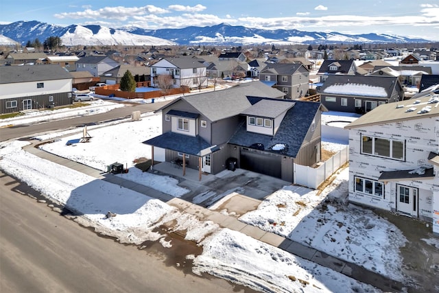 bird's eye view featuring a mountain view and a residential view