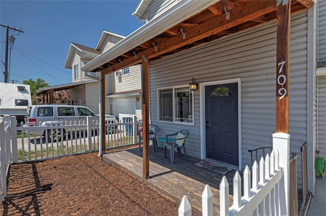 property entrance with fence