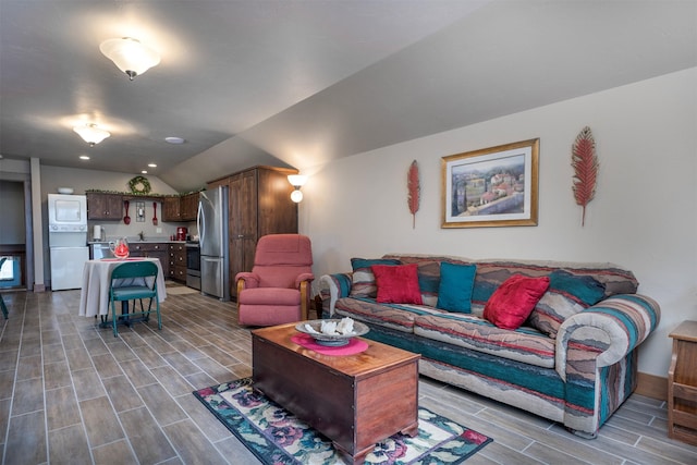 living room with wood tiled floors, vaulted ceiling, and recessed lighting